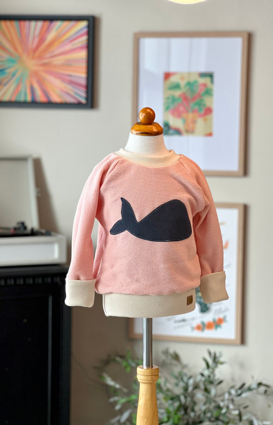Pink salt waffle GWM pullover with whale appliqué